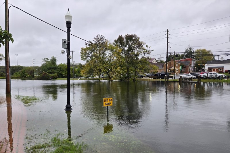 Downtown Milton flooded Sunday afternoon. Strong winds kept the waters of the Broadkill River from receding at low tide. HEATHER FLOOD PHOTO
